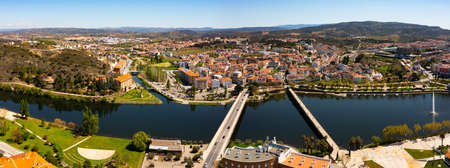 Panorama of Mirandela cityscape on banks of Tua river, Portugalの写真素材