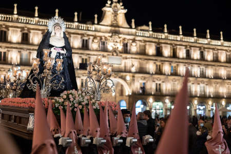 Brotherhood carrying paso of Our Lady of Tears during Holy Week procession in Salamancaのeditorial素材