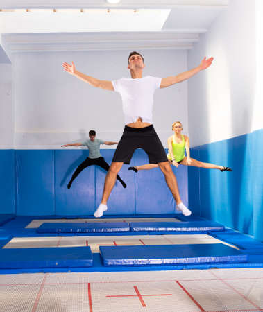 People jumping in trampoline centerの写真素材