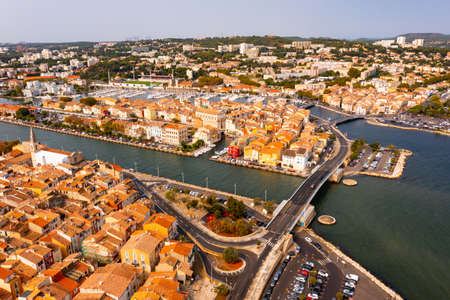Aerial view of the administrative center with residential areas of the seaside town of Martiguesの写真素材