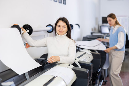 Woman working in publishing facility