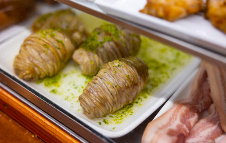 Uncooked madejas aragones on counter in cafeの写真素材