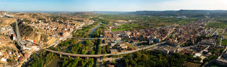 Panoramic aerial view of Spanish town of Fraga on Cinca riverの写真素材