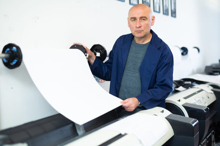 Man working in publishing facility