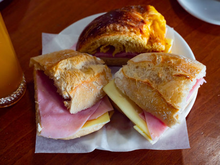 Bread with ham and cheese. Delicious beer snackの写真素材