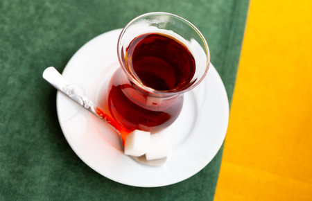 Turkish tea in traditional glass served in cafe