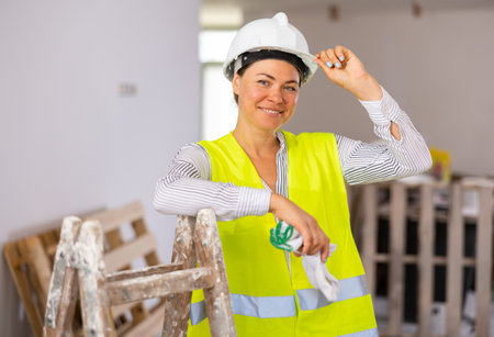 Portrait of a young woman engineer in uniformの写真素材
