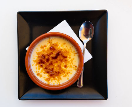 Just cooked burned cream, creme brulee, served in ramekinの写真素材