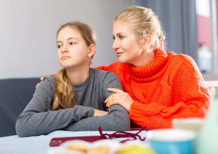 Sad teen girl after discord with her mother
