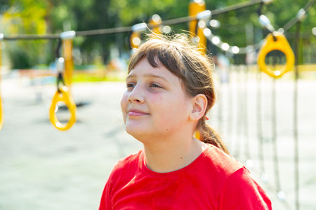 Portrait of girl standing on playground