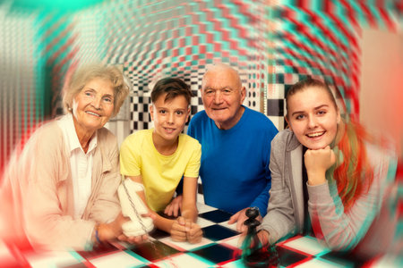 Grandkids and grandparents in escape roomの写真素材
