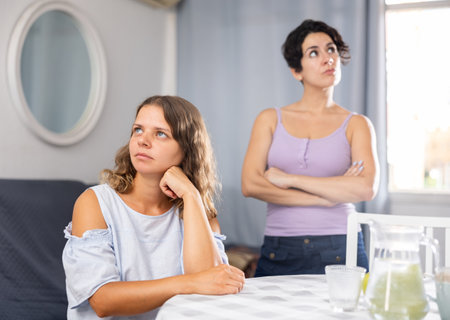 Angry irritated young adult woman dont speaking after discord with girlfriendの写真素材