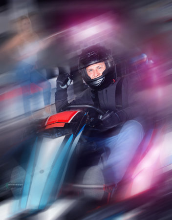 Man finishing race on racing car at kart circuitの写真素材