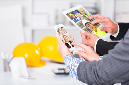 Business team using phone and tabletの写真素材