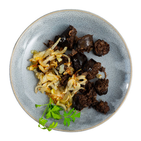 Spanish blood sausage morcilla served with grilled onionの写真素材