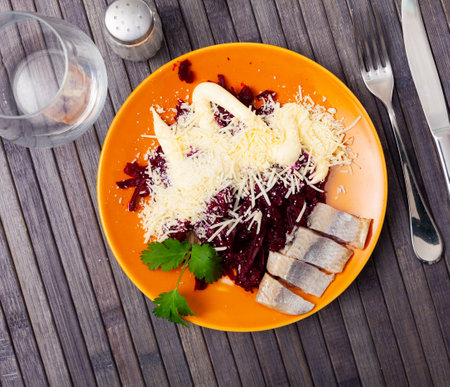 Appetizing beetroot with cheese and herringの写真素材