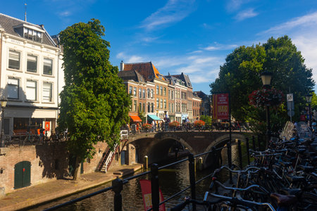 Utrecht embankment and arched bridge over Oudegracht canal in summerのeditorial素材