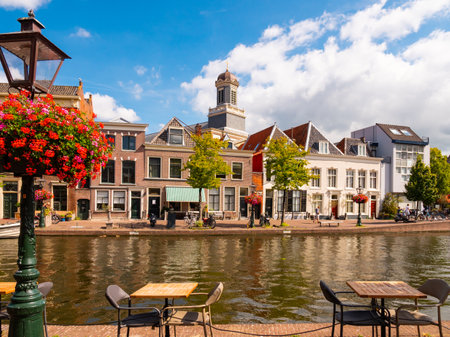 Waterways and street with historic houses in the center of the Dutch student city Leiden.のeditorial素材