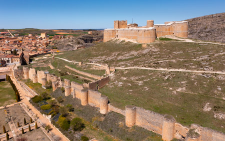 Berlanga de Duero medieval castle ruin near Soria, in the Castilla Leon region Spain with blue sky from airの写真素材