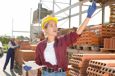 Female worker calling out for someone