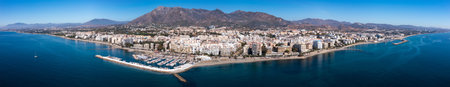 Panorama of Spanish coastal city of Marbella by Mediterranean seaの写真素材