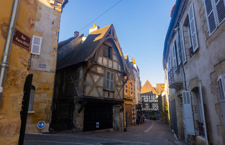 Street in historic district of Montlucon with timber-framed housesのeditorial素材