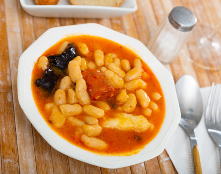 Traditional dish of Spanish cuisine is Fabada soupの写真素材