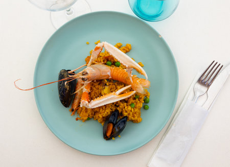 Just cooked paella de marisco on tableの写真素材