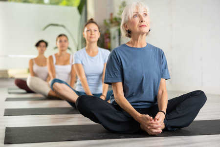 Woman making yoga meditation in lotus pose