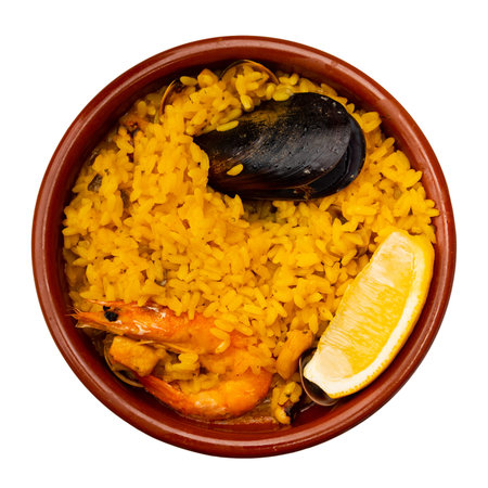 Paella de marisco, served on plateの写真素材