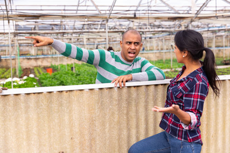 workers talking at vegetable plant factoryの写真素材