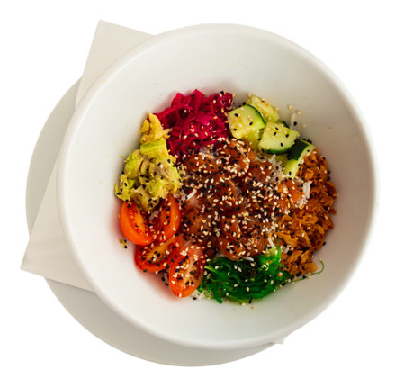 Salmon poke with avocado, wakame and fried onion