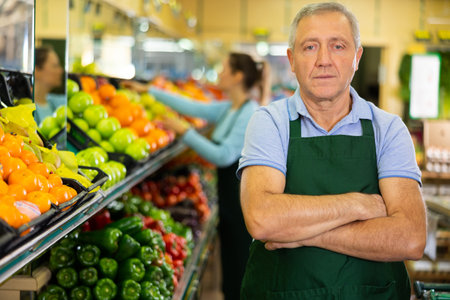 vegetable salesman in supermarketの写真素材