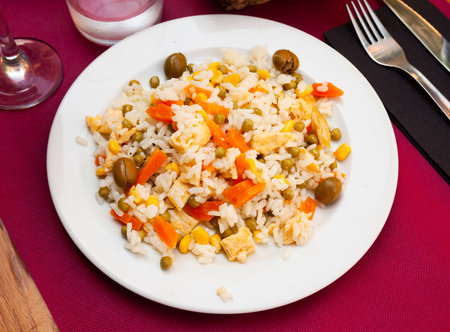 Mix salad with boiled rice, corn and omlette at plateの写真素材