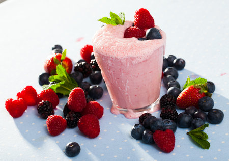 Tasty berry milk smoothie closeup. High quality photoの写真素材