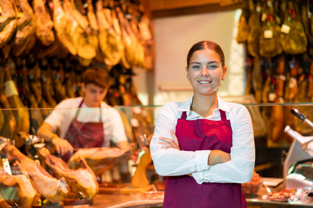 Portrait of positive woman jamon sellerの写真素材