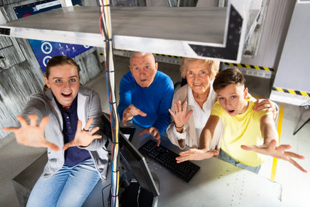 Group photo of grandparents and grandchildren in escape roomの写真素材