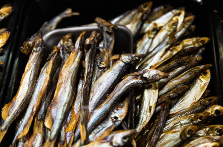Cold smoked fish on store counterの写真素材