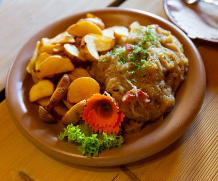 Pork ribs with stewed cabbage and baked potatoes - Polish cuisineの写真素材