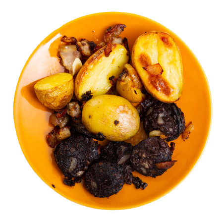 Fried blood sausage with potatoes served at plateの写真素材