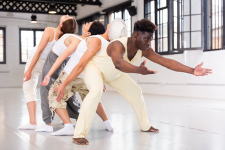 Four artists playing art performanceの写真素材