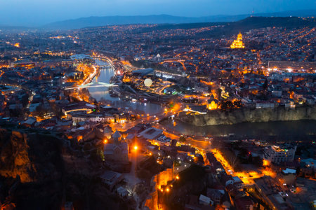 Night aerial view of Tbilisi city with Kura riverの写真素材