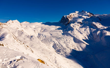 Winter landscape of mountain peaks located near the of Zermatt