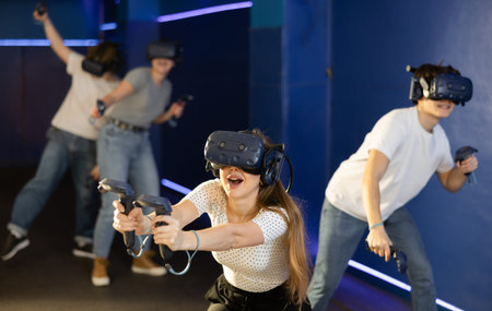 Friends using virtual reality glasses people having fun with technology vr headset