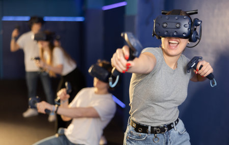 Friends using virtual reality glasses - people having fun with technology vr headset