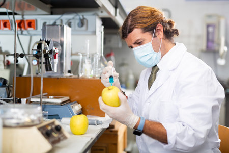 Man technician working in food testing laboratoryの写真素材