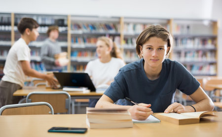 Fifteen-year-old schoolboy writes an synopsisの写真素材