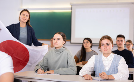 Young girls students study diligently at schoolの写真素材