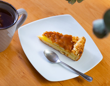 Small piece of fresh soft apple pie with delicate crispy crustの写真素材