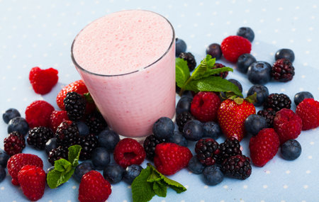 Smoothie with milk and berriesの写真素材